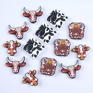 Cow themed PVC shoe charms set featuring highland cow and cartoon designs for clogs