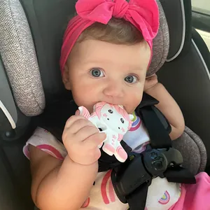 Pink and white unicorn teether toy made of food-grade silicone for babies