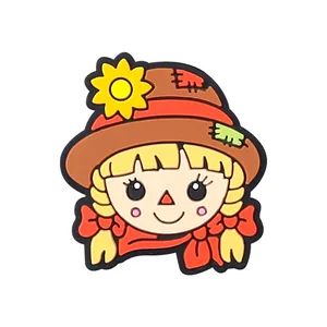 Abalorio para zapatos de niña espantapájaros con sombrero de girasol y lazo rojo
