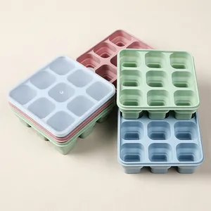 Top view of multi-color 9-slot silicone ice cube trays with transparent lids for stacking