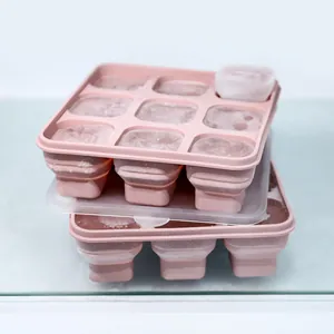 Macro shot of pink flexible food-grade silicone ice tray with 9 grids and lid