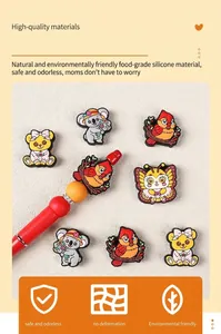Detail of colorful food-grade silicone animal beads including koala and butterfly
