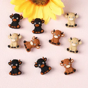DIY 3D highland cow silicone beads in black, brown, and beige for craft projects
