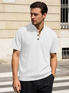 Detail of white corduroy henley shirt with brown suede trim and vintage buttons