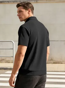 Detailed back view of men's black corduroy polo shirt with vertical striped texture