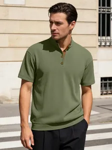 Detail of olive green corduroy polo with mock neck and vintage button neckline