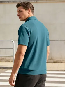 Detail of teal short-sleeve polo shirt featuring a unique pleated texture and ribbed cuffs