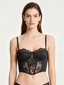 Detailed front view of black lace bustier with satin panels and delicate eyelash trim