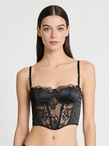 Detailed view of the black lace corset top with adjustable straps and satin paneling