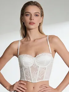 Detail of white satin and floral lace corset top with adjustable spaghetti straps