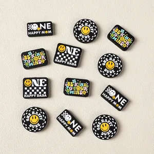 Cartoon smiley face silicone shoe charms set including colorful flowers and text designs