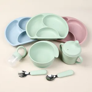 Macro detail of food grade silicone baby plate bowl cup and steel cutlery set