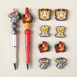 DIY cardinal and butterfly silicone bead pens with creative cartoon animal charms