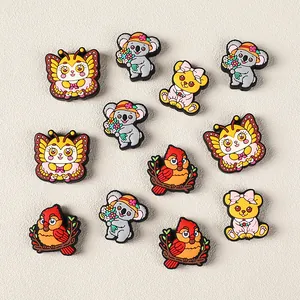 Cartoon animal shoe charms set featuring koala, butterfly, red bird, and yellow bear
