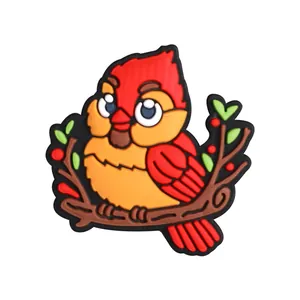 Cartoon red cardinal silicone bead with green heart leaf on white background