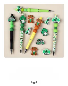 Detailed view of St. Patrick's Day DIY silicone beads featuring green gnomes and shamrocks