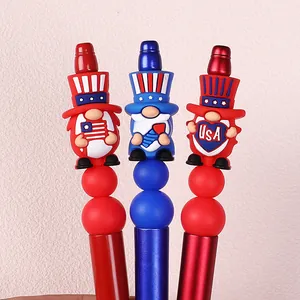 Three USA Independence Day gnome pens with American flag motifs and red blue metallic finish