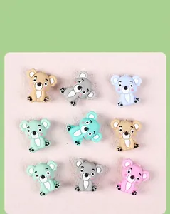 Macro view of 3D silicone koala beads in various pastel colors for DIY jewelry crafts