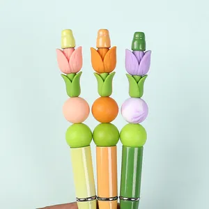 3D tulip silicone beads and creative pens in pink, orange and purple macaroon colors