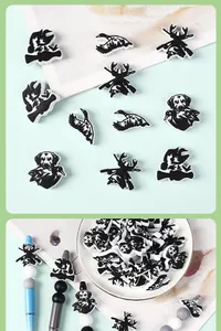 Detail of DIY silicone hunting beads featuring duck and hound designs for craft jewelry