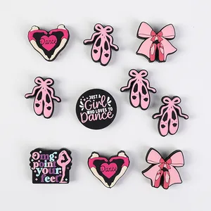 10-piece ballet themed PVC shoe charms set with pink and black bows and dance slogans