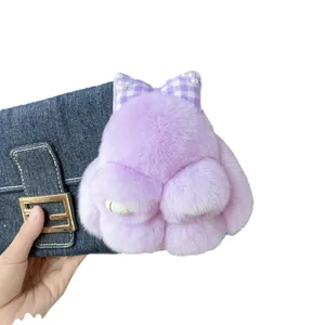 Porte-clés lapin mignon en fourrure de lapin violette avec nœud papillon et perle