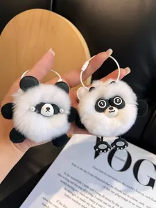 Detailed view of plush panda keychains made from real rex rabbit fur with soft texture
