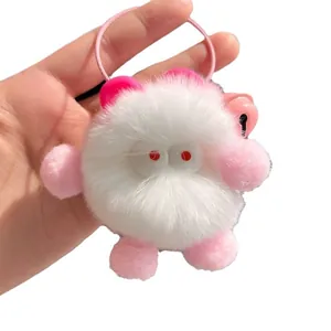 Llavero de monstruo de peluche blanco con orejas y extremidades rosas para bolsos