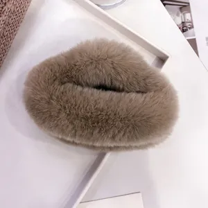 Detailed view of the soft brown faux fur texture on this winter cloud hair claw clip