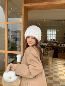 Thickened white faux rabbit fur hat for women with ear protection for winter warmth