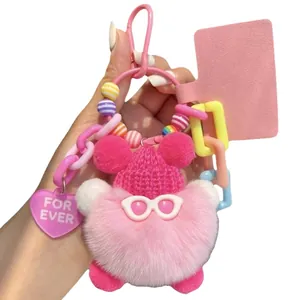 Pink plush charcoal ball keychain with knit hat and glasses for backpack decor