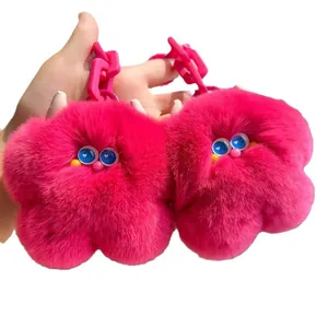 Portachiavi a mucca in peluche rosa con grandi occhi e catena in plastica rosa