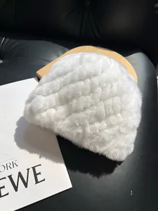 Detail of soft white faux rabbit fur hat texture on elegant minimalist props