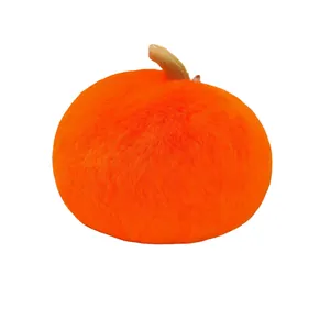 Cute large plush persimmon keychain made of soft faux rabbit fur in bright orange