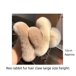 Detail of a large 16cm Rex Rabbit fur claw clip in beige showing plush texture and size