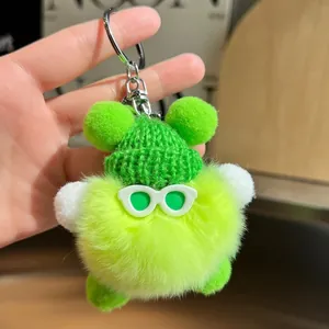 Porte-clés monstre en peluche vert néon avec bonnet en tricot et lunettes