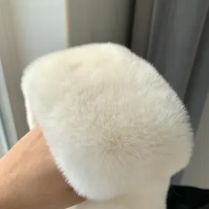 Close-up of thick white faux fur material showing soft fluffy texture and high density