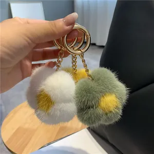 Porte-clés fleurs en fourrure de vison colorée avec anneaux dorés pour sacs à main