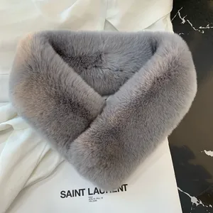 Plush faux rabbit fur scarf in dusty purple with a stylish criss-cross design for winter