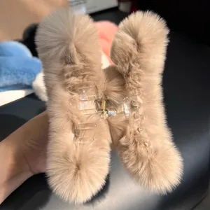 Large light brown fluffy faux rabbit fur hair claw clip for thick hair in autumn winter