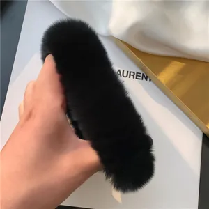 Luxurious fluffy black plush phone case made of soft faux fur with a premium velvet texture