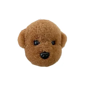 Cute brown teddy dog plush keychain accessory with fluffy curly lamb wool texture