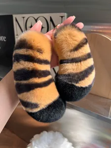 Plush faux fur tiger tail keychains with golden metal clasp for bags and gift use