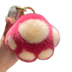 Plüsch Katzenpfote Schlüsselanhänger in Rosa und Weiß mit goldener Ringöse