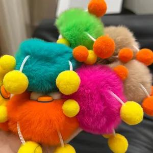 Rex rabbit fur plush ball duck keychain charm in various bright colors for handbags
