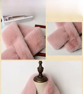 Macro details of pink faux fur scarf showing soft plush texture and refined sewing edges