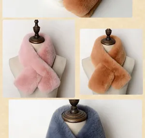 Close-up of soft faux rabbit fur cross scarf available in pink, camel and dark grey