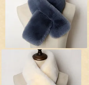 Detail of soft faux fur scarves in grey and white colors showing the cross-over design