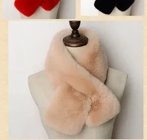 Detailed view of the soft faux fur texture and the cross-buckle closure of the winter scarf