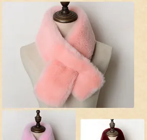 Detail showing the plush texture and cross-over design of this faux rabbit fur scarf
